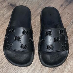 Gucci Black Embossed Logo Rubber Slides